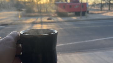 photo of cup of coffee in Barronett with sun rise